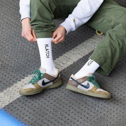 white & green crew skater socks on model