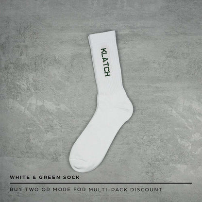 white & green text crew socks flat