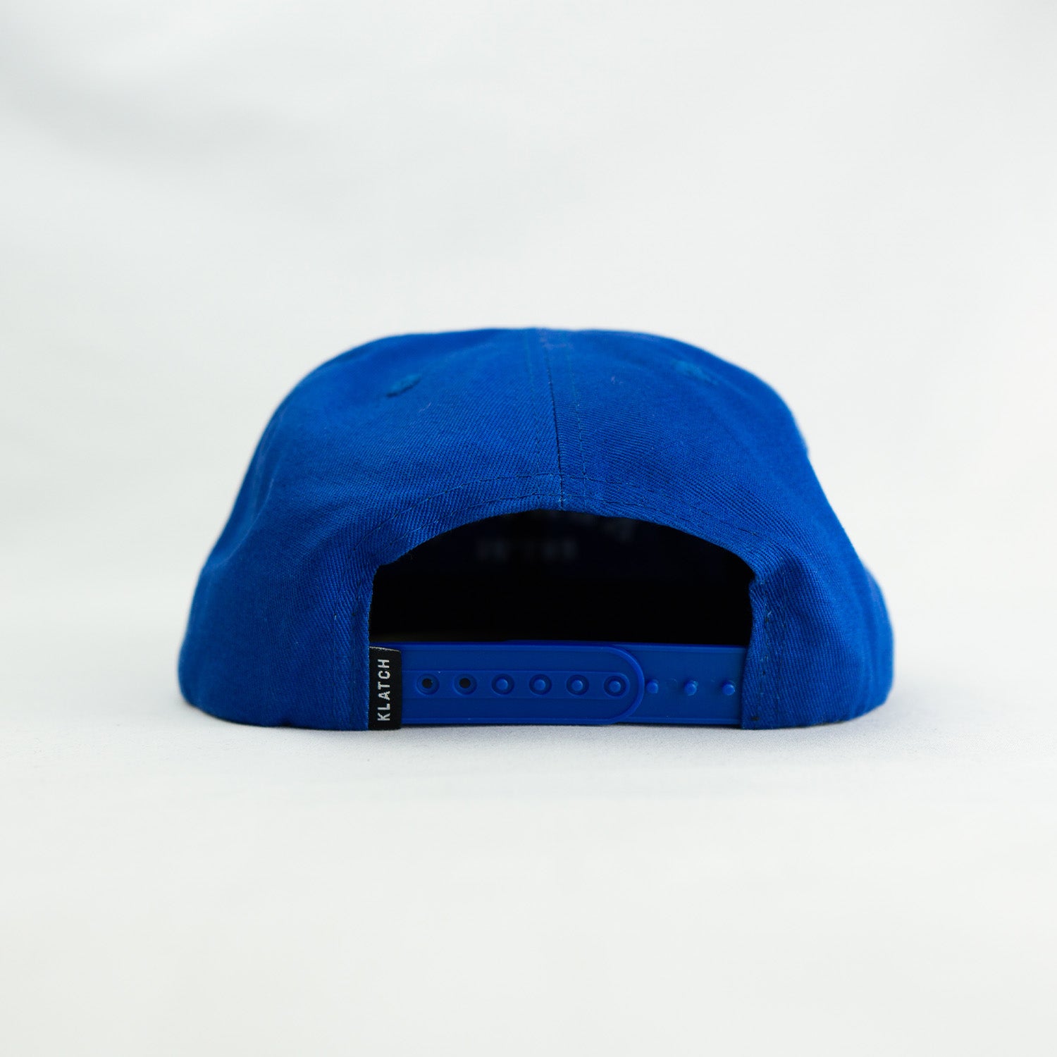 klatch co campbell snapback cap in navy and white back view