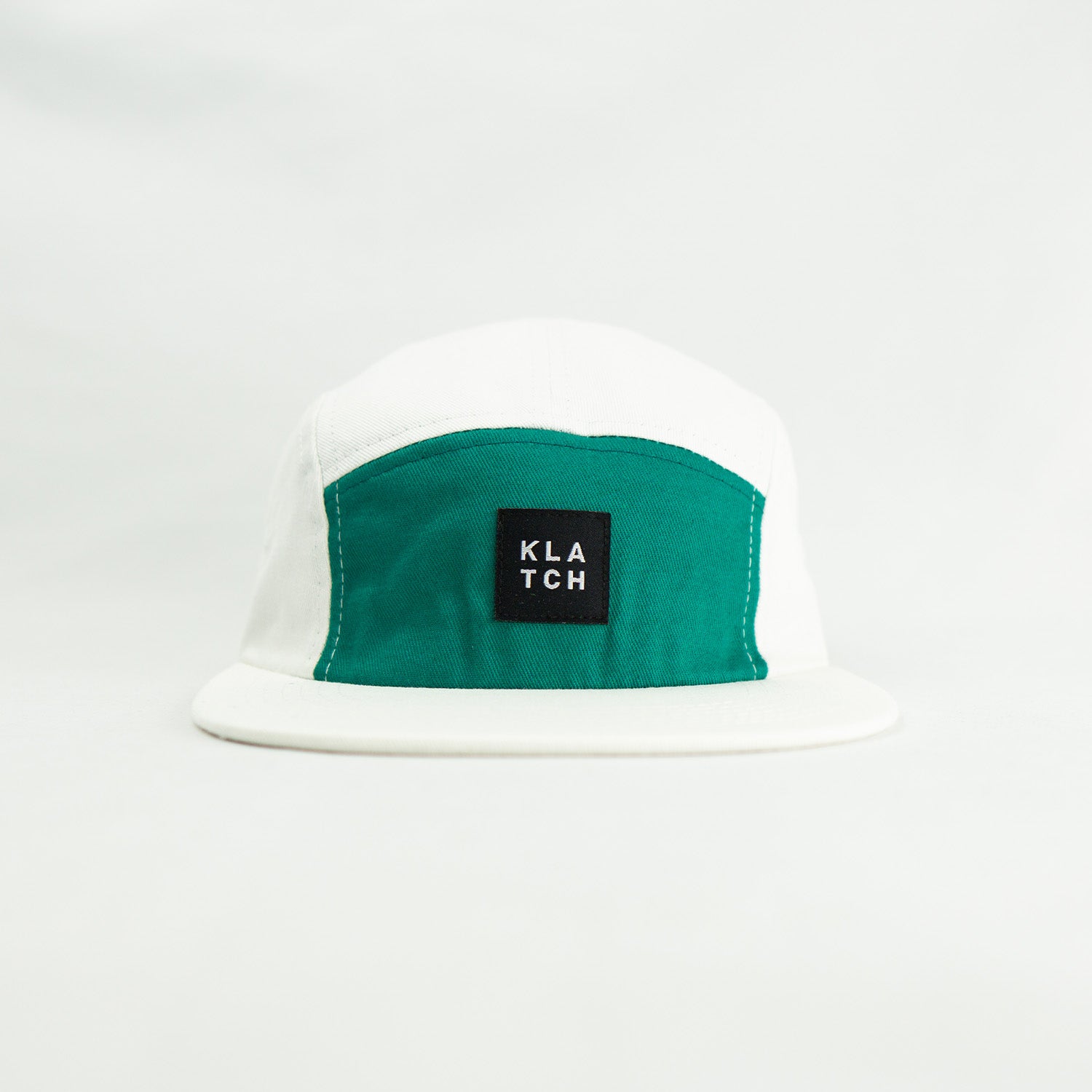 klatch co linden 5 panel cap in white and green front